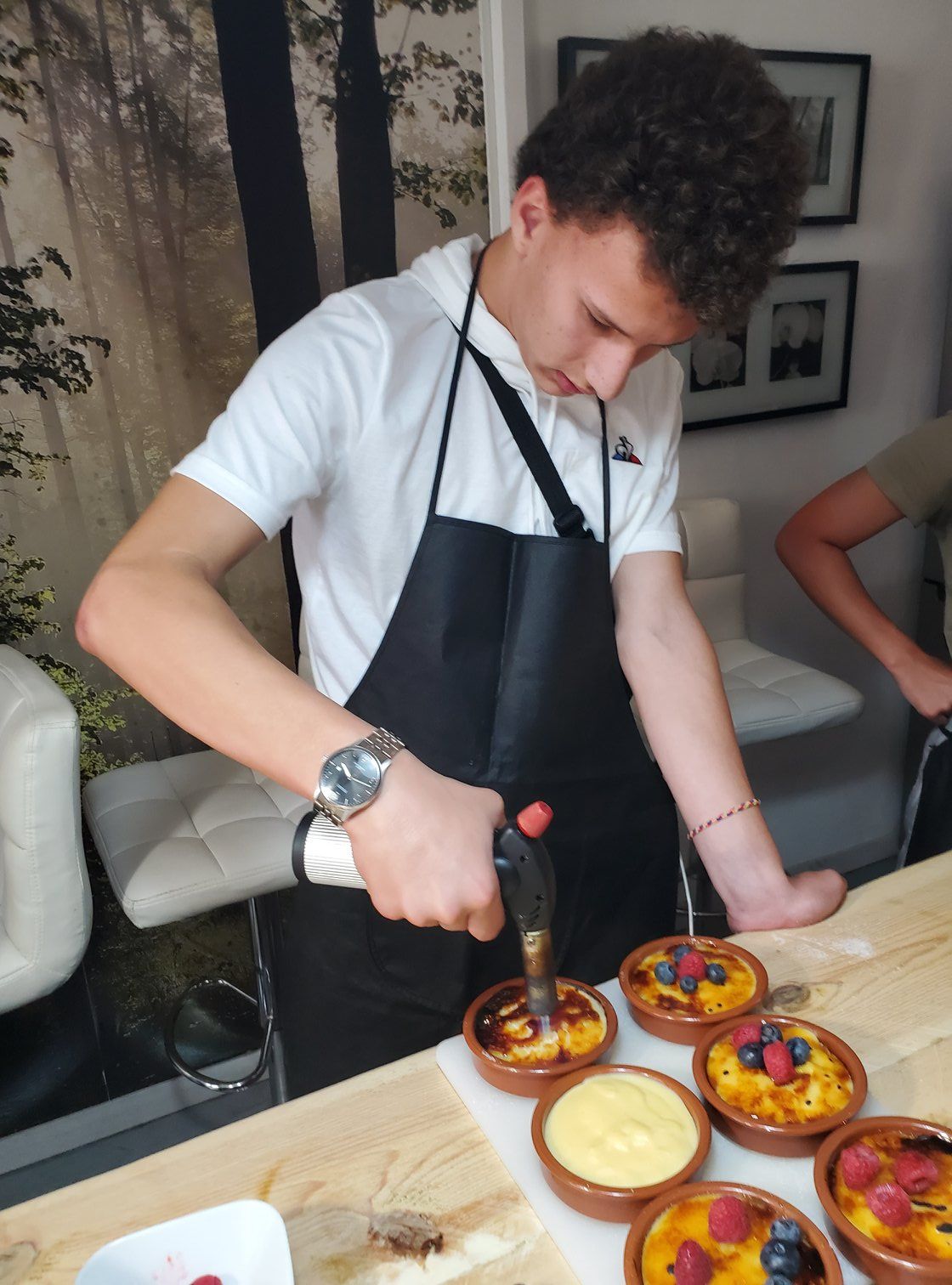One of Roger's sons cooking in Barcelona