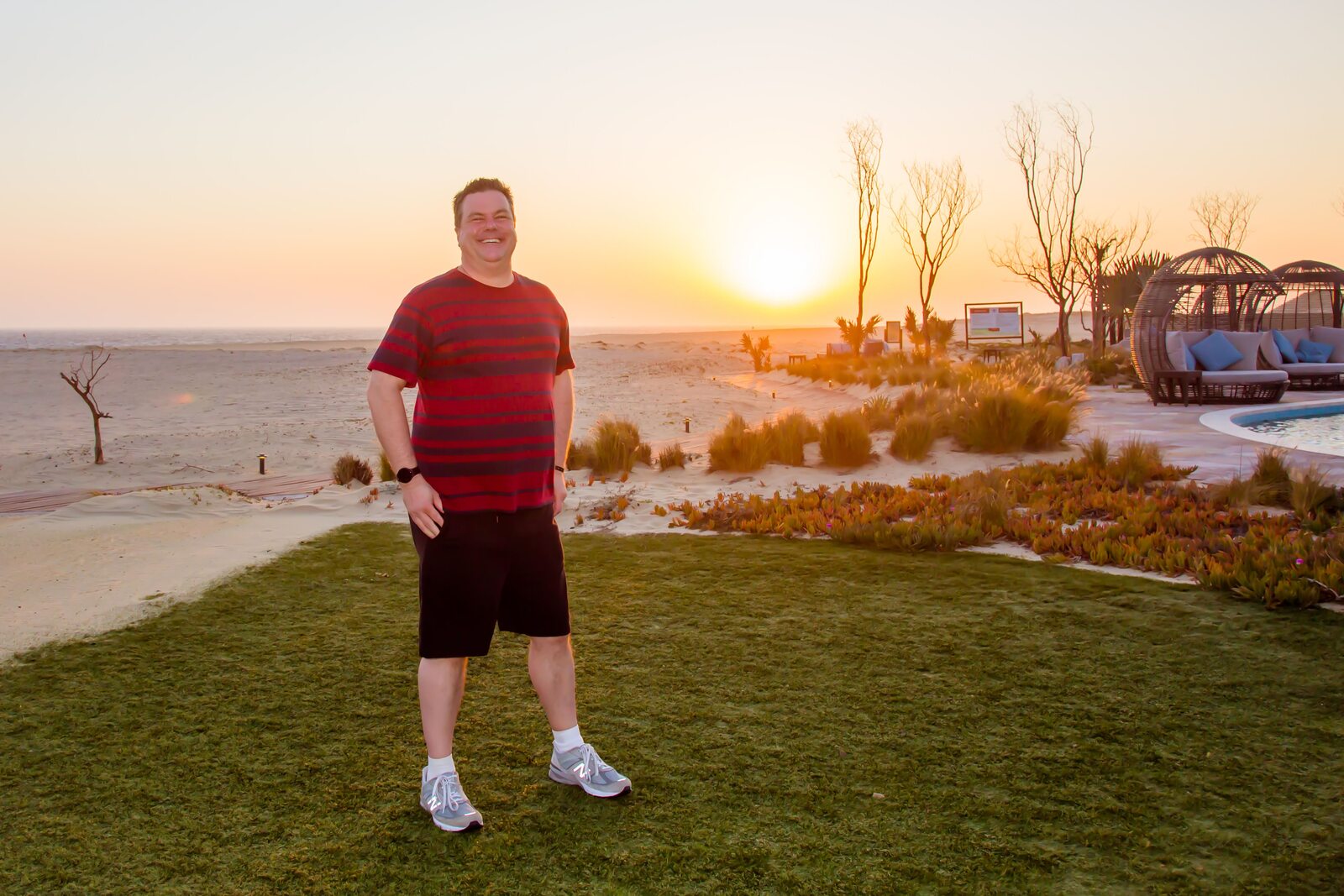 Roger standing by the coast in warm sunset light in Los Cabos